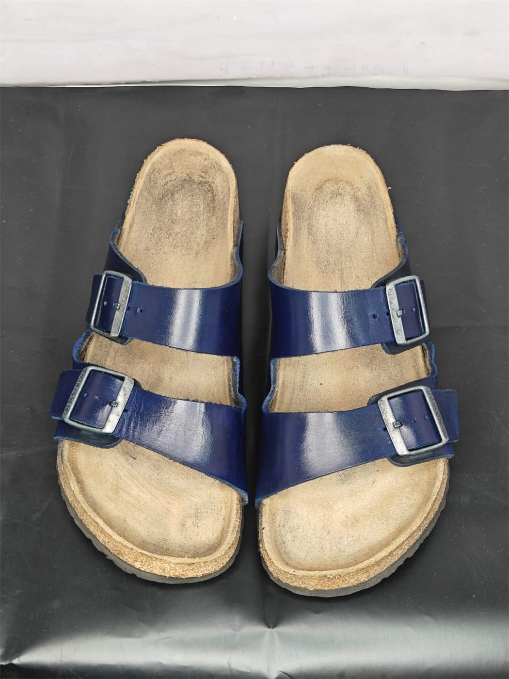 The same Birkenstock sandals after cleaning