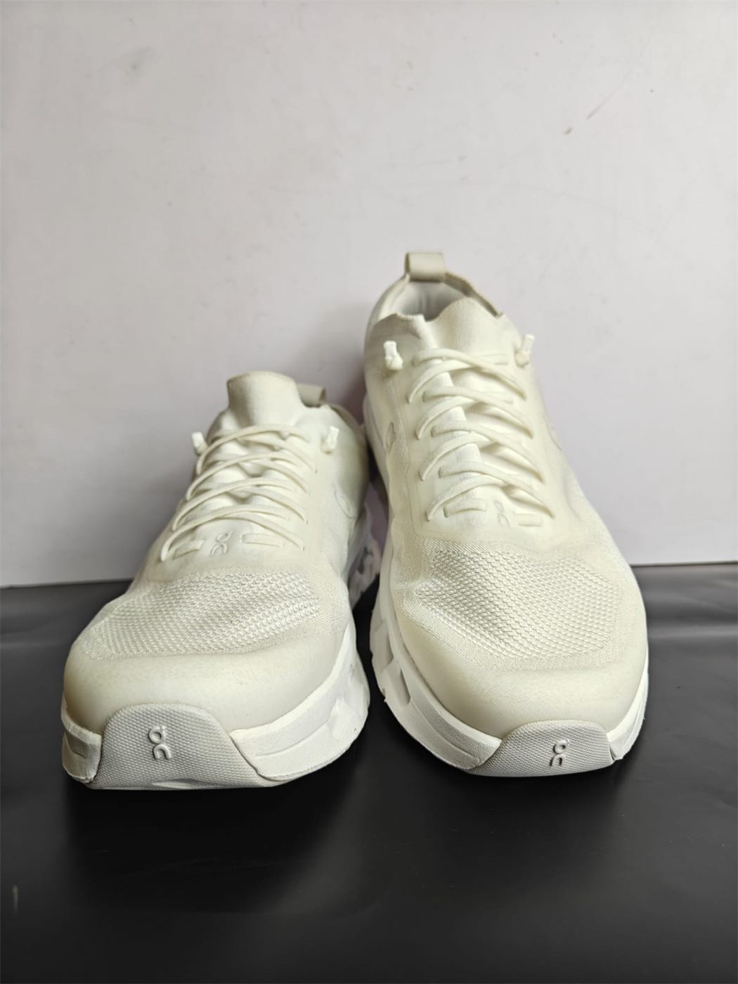 The same On Cloud running shoes after cleaning