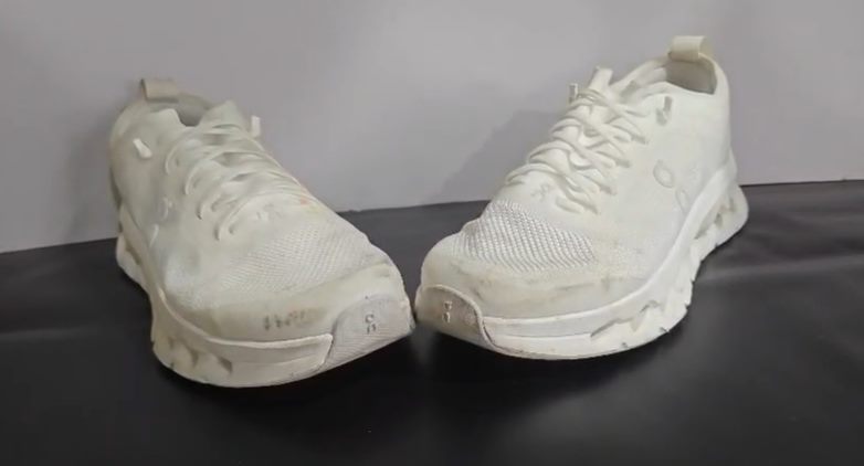 White On Cloud running shoes before cleaning